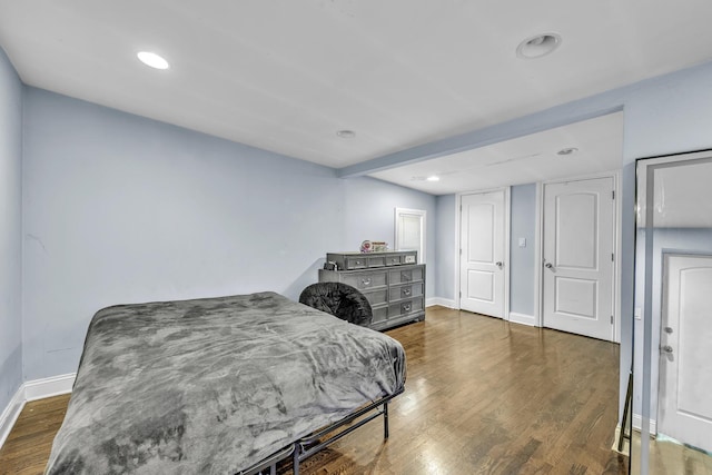 7627 S Prairie Ave, Chicago, IL 60619 - bedroom with wood finished floors and recessed lighting