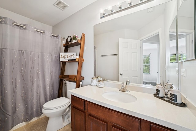 234 Cassidy Ln, Elgin, IL 60124 - bathroom featuring vanity, tile patterned flooring, and a shower with shower curtain