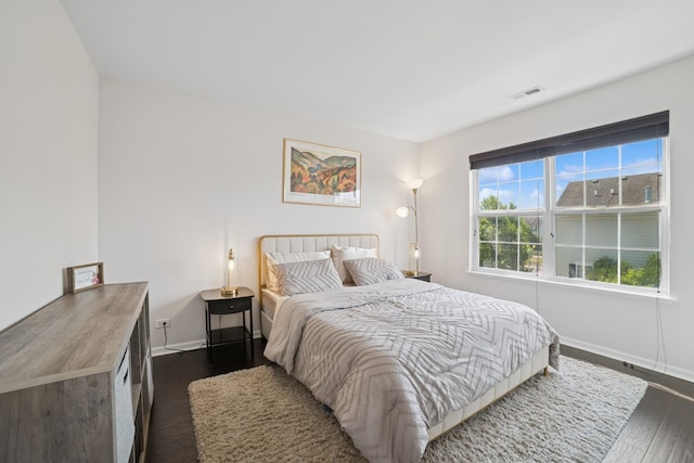 234 Cassidy Ln, Elgin, IL 60124 - bedroom featuring dark wood-style floors and baseboards