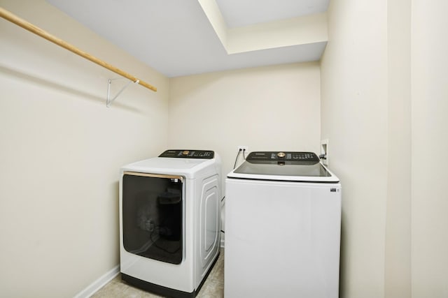 234 Cassidy Ln, Elgin, IL 60124 - washroom with washing machine and dryer and baseboards