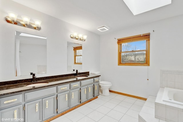 13714 S Janas Pkwy, Homer Glen, IL 60491 - bathroom with double vanity, a bath, and a skylight