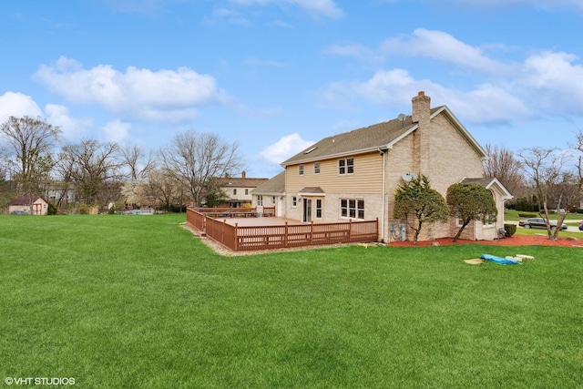 13714 S Janas Pkwy, Homer Glen, IL 60491 - back of property featuring a chimney, a yard, and a wooden deck