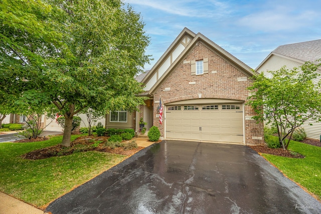 1728 Briarheath Dr, Aurora, IL 60505 - view of front of property with brick siding, driveway, an attached garage, a front lawn, and stucco siding