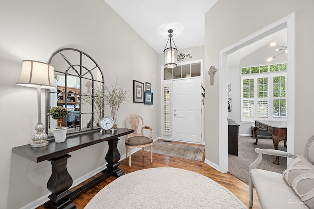 1728 Briarheath Dr, Aurora, IL 60505 - foyer entrance featuring wood finished floors and lofted ceiling