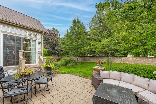 1728 Briarheath Dr, Aurora, IL 60505 - fenced backyard with outdoor lounge area, a patio area, and outdoor dining area