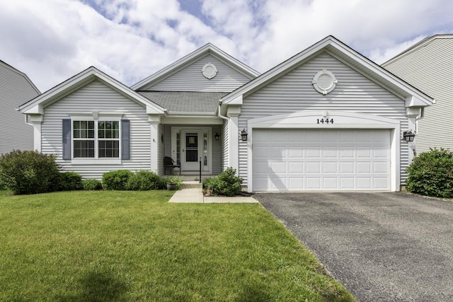 1444 Baroque Ave, Volo, IL 60073 - view of front facade featuring driveway, a garage, a front yard, and roof with shingles