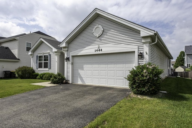 1444 Baroque Ave, Volo, IL 60073 - ranch-style house featuring driveway, a garage, and a front yard