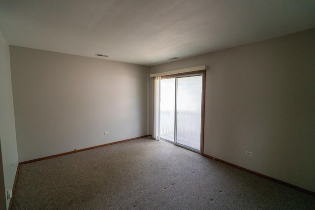 89 Maude Ave Unit A, Fox Lake, IL 60020 - empty room with light carpet and baseboards