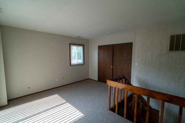 89 Maude Ave Unit A, Fox Lake, IL 60020 - carpeted spare room with baseboards
