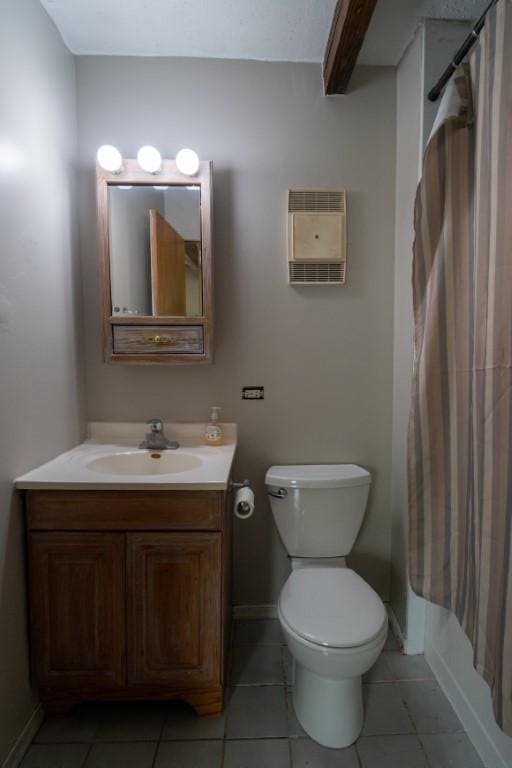 89 Maude Ave Unit A, Fox Lake, IL 60020 - bathroom with vanity, heating unit, and tile patterned flooring