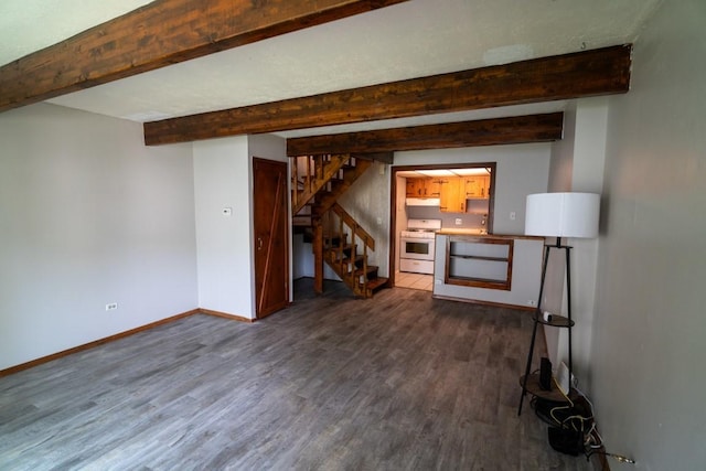 89 Maude Ave Unit A, Fox Lake, IL 60020 - unfurnished living room featuring dark wood-style floors, beamed ceiling, and stairs