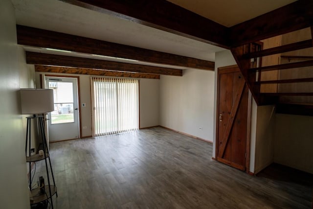 89 Maude Ave Unit A, Fox Lake, IL 60020 - unfurnished living room with beamed ceiling and wood finished floors