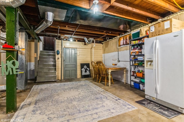 916 Pearl St, Aurora, IL 60505 - unfinished basement featuring white fridge with ice dispenser