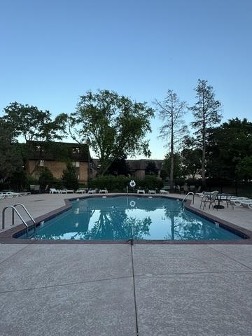 1 Oak Creek Dr Unit 2305, Buffalo Grove, IL 60089 - community pool featuring a patio area