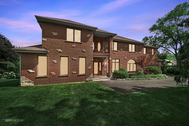 404 W Camp Mcdonald Rd, Prospect Heights, IL 60070 - view of front of house with a front yard, brick siding, and roof with shingles