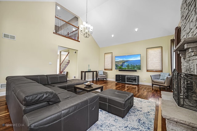 404 W Camp Mcdonald Rd, Prospect Heights, IL 60070 - living room with wood finished floors, high vaulted ceiling, stairway, a fireplace, and a chandelier