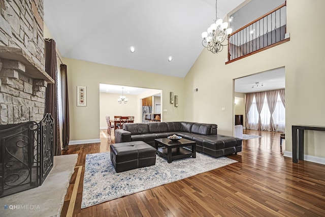 404 W Camp Mcdonald Rd, Prospect Heights, IL 60070 - living room with a chandelier, high vaulted ceiling, wood finished floors, and a large fireplace