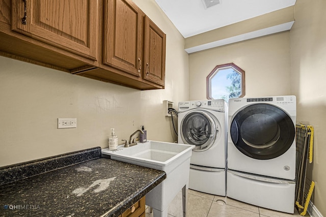 404 W Camp Mcdonald Rd, Prospect Heights, IL 60070 - laundry room with washing machine and dryer, cabinet space, and light tile patterned floors