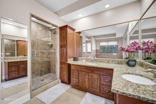 404 W Camp Mcdonald Rd, Prospect Heights, IL 60070 - bathroom with a stall shower, double vanity, tile patterned floors, and recessed lighting