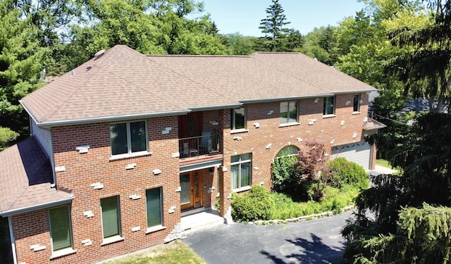 404 W Camp Mcdonald Rd, Prospect Heights, IL 60070 - view of building exterior with an attached garage and driveway