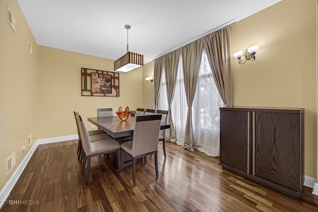 404 W Camp Mcdonald Rd, Prospect Heights, IL 60070 - dining room featuring dark wood-style flooring and baseboards