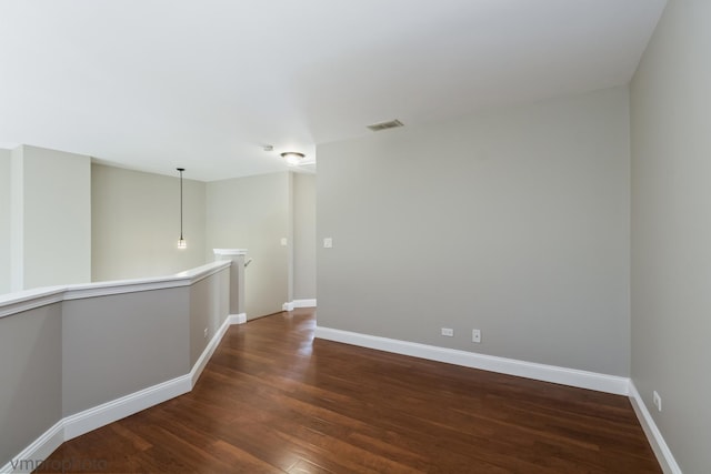 5584 Lavender Ct, Rolling Meadows, IL 60008 - spare room featuring dark wood finished floors and baseboards