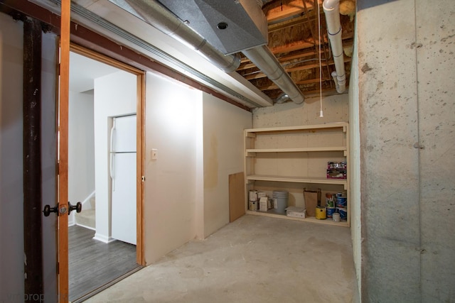 5584 Lavender Ct, Rolling Meadows, IL 60008 - unfinished basement featuring freestanding refrigerator