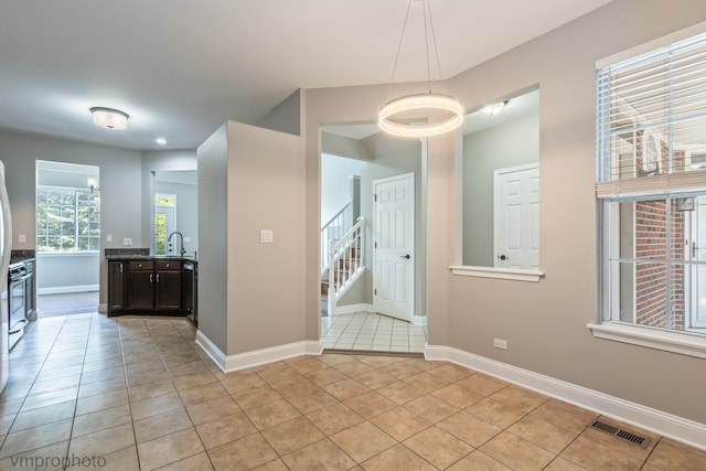 5584 Lavender Ct, Rolling Meadows, IL 60008 - interior space featuring light tile patterned floors and stairway