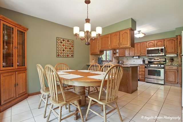 1815 Vineyard Ln, Spring Grove, IL 60081 - dining room featuring light tile patterned floors and a chandelier