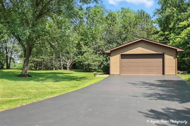 1815 Vineyard Ln, Spring Grove, IL 60081 - view of front of home with a detached garage, an outdoor structure, and a front lawn