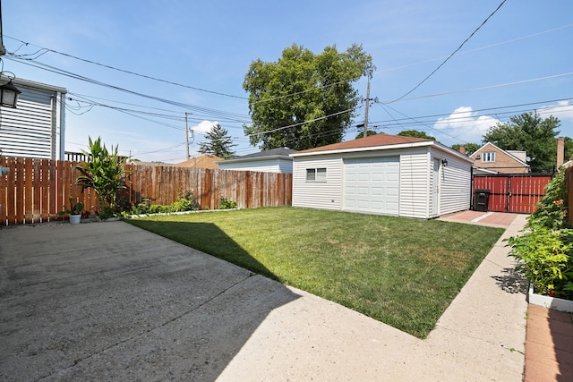 5339 S Kildare Ave, Chicago, IL 60632 - fenced backyard with a patio, an outdoor structure, and a garage