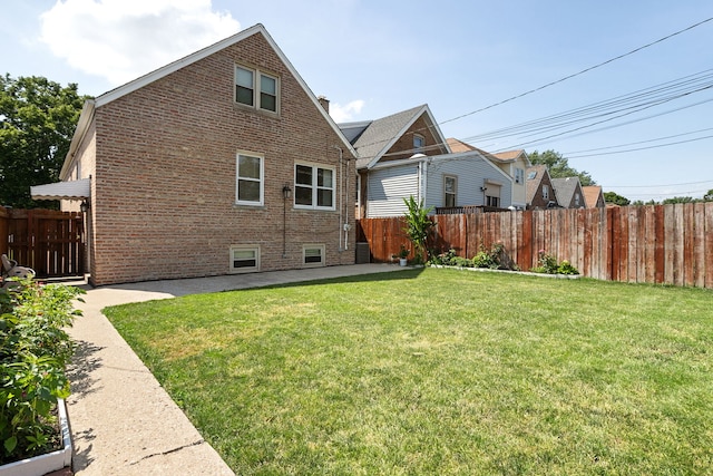 5339 S Kildare Ave, Chicago, IL 60632 - back of property with brick siding and a patio area