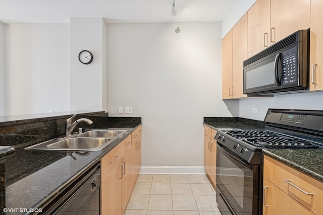 330 N Jefferson St Unit 2102, Chicago, IL 60661 - kitchen featuring black appliances, dark stone counters, light tile patterned flooring, and light brown cabinets