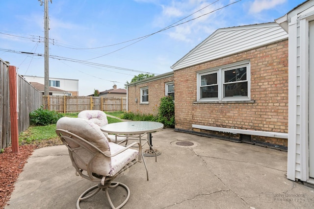 7025 W Berwyn Ave, Chicago, IL 60656 - fenced backyard with a patio