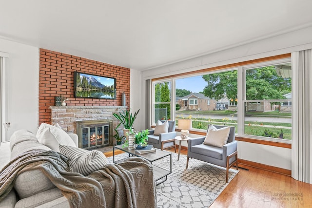7025 W Berwyn Ave, Chicago, IL 60656 - living room featuring a fireplace and wood finished floors