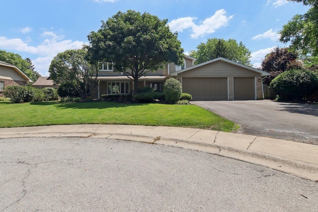 10215 S 87th Ct, Palos Hills, IL 60465 - view of front of house featuring an attached garage, driveway, and a front lawn