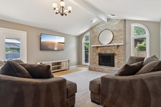 10215 S 87th Ct, Palos Hills, IL 60465 - living room with wood finished floors, a chandelier, and a fireplace