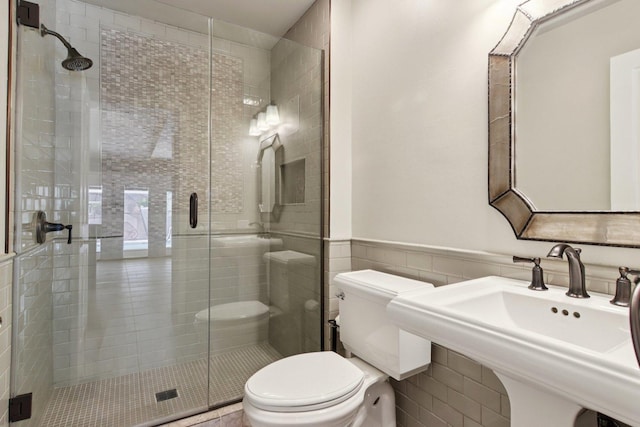 10215 S 87th Ct, Palos Hills, IL 60465 - full bathroom with a shower stall, tile walls, and wainscoting
