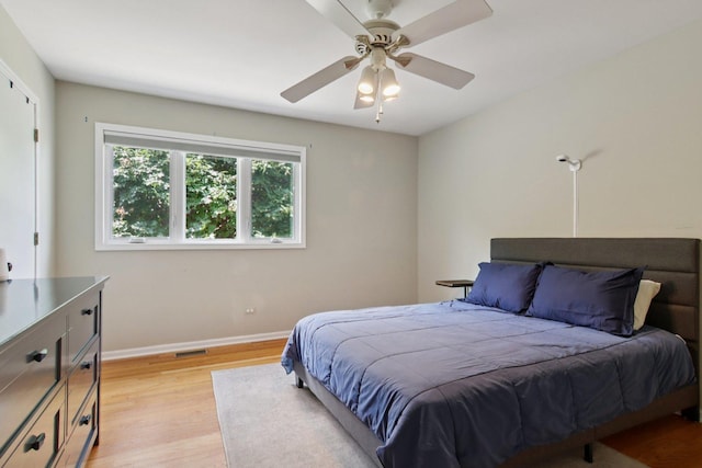 10215 S 87th Ct, Palos Hills, IL 60465 - bedroom featuring light wood finished floors and a ceiling fan