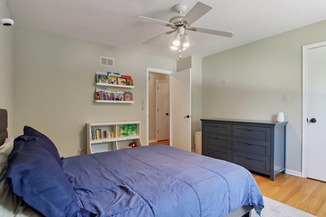 10215 S 87th Ct, Palos Hills, IL 60465 - bedroom with light wood-type flooring and a ceiling fan