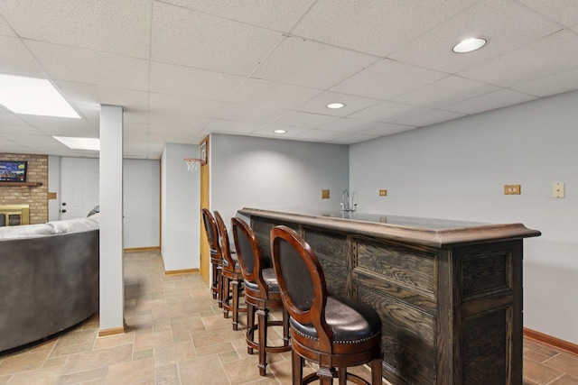 10215 S 87th Ct, Palos Hills, IL 60465 - indoor bar with light stone finish flooring, recessed lighting, and a paneled ceiling