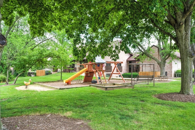 740 Saint Andrews Ln Unit 5, Crystal Lake, IL 60014 - view of play area with a lawn