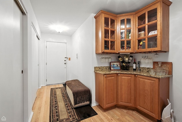 740 Saint Andrews Ln Unit 5, Crystal Lake, IL 60014 - indoor dry bar featuring light wood-type flooring and baseboards