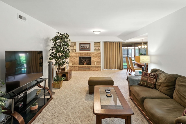 740 Saint Andrews Ln Unit 5, Crystal Lake, IL 60014 - living area with carpet floors, a chandelier, and a fireplace
