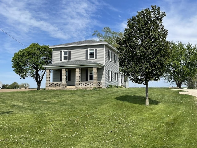 6808 S Oak Grove Rd, Harvard, IL 60033 - traditional style home featuring covered porch and a front lawn
