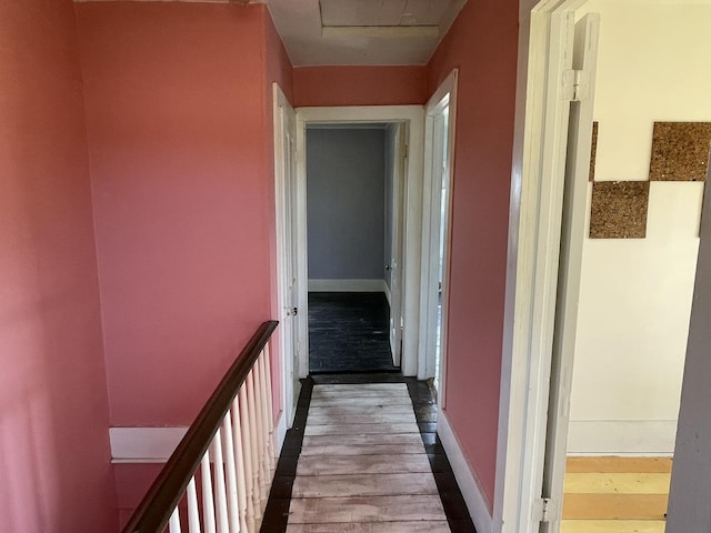 6808 S Oak Grove Rd, Harvard, IL 60033 - corridor with dark wood finished floors and baseboards