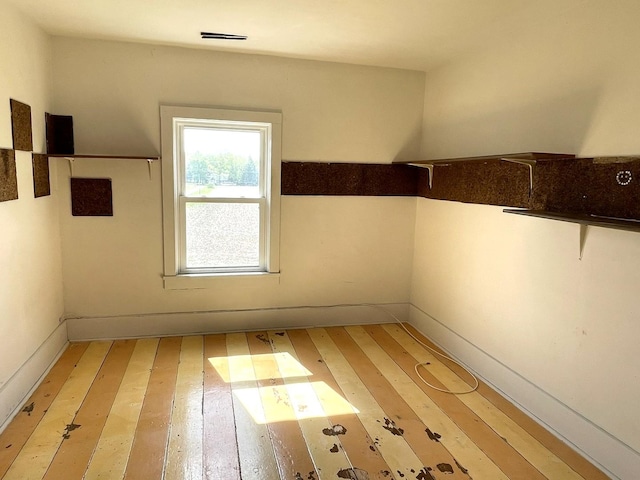6808 S Oak Grove Rd, Harvard, IL 60033 - unfurnished room featuring light wood-style floors
