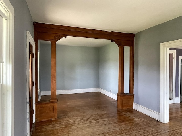 6808 S Oak Grove Rd, Harvard, IL 60033 - spare room featuring wood finished floors and decorative columns