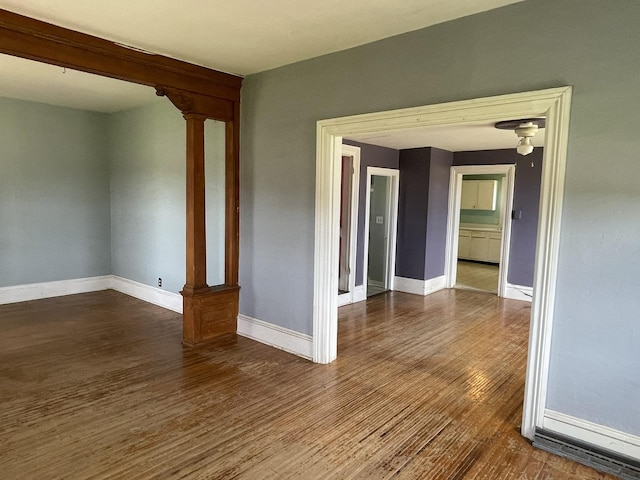 6808 S Oak Grove Rd, Harvard, IL 60033 - unfurnished room with wood finished floors and baseboards