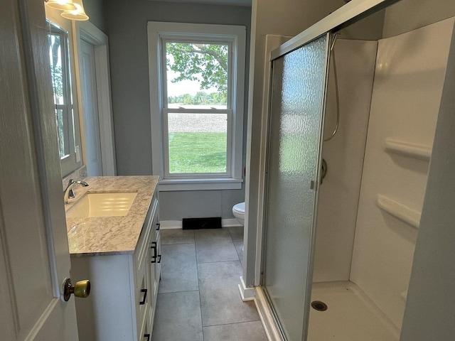 6808 S Oak Grove Rd, Harvard, IL 60033 - bathroom with vanity, tile patterned floors, and a stall shower